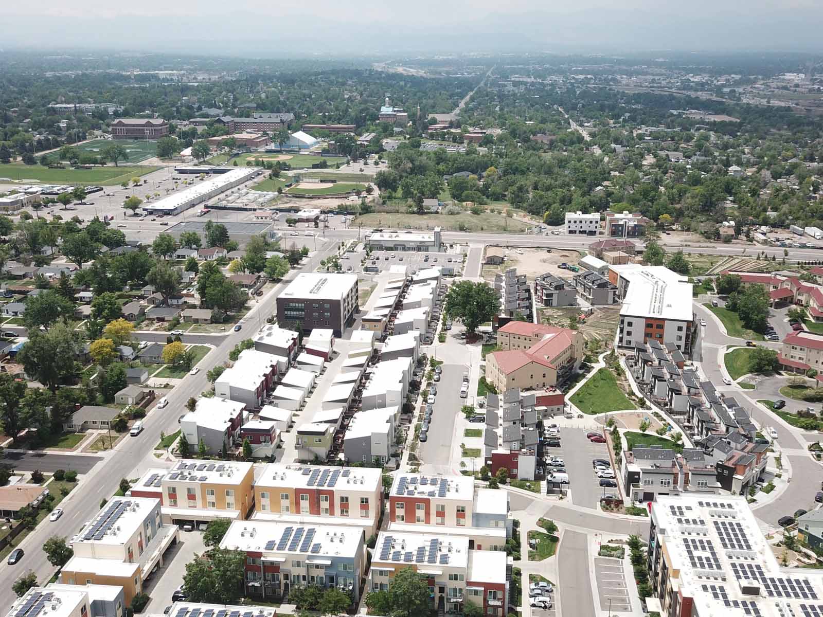 Aria Denver, Zen Condos, Luxury Denver Colorado Townhomes Drone View - Weins Development Group - Award-winning real estate developers in Denver, Colorado. Top #1 of Builders producing high-quality townhomes, condos, apartments, retail, & office projects